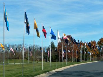 Panoramic shot of flags against sky