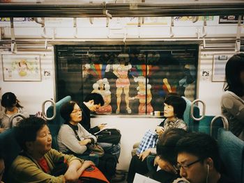 Woman sitting in train