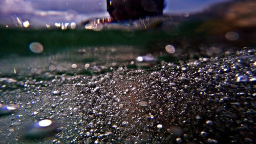 Close-up of illuminated water at night