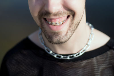 Close-up portrait of a smiling young man