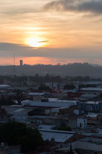 High angle view of townscape against sky during sunset