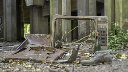 Damaged chair in abandoned building