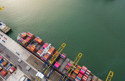 High angle view of commercial dock by sea