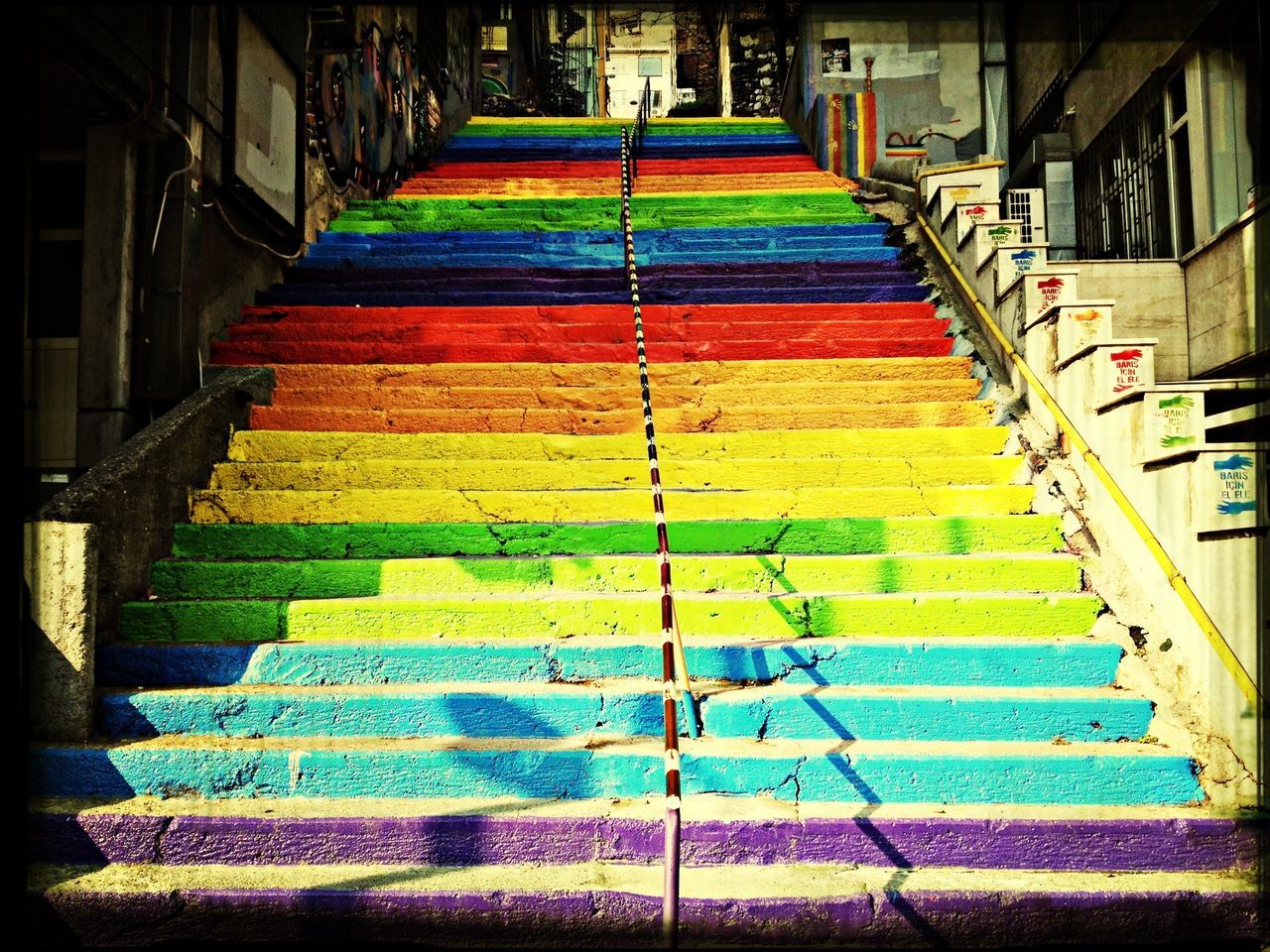 architecture, built structure, building exterior, multi colored, steps, railing, steps and staircases, staircase, colorful, no people, house, in a row, outdoors, high angle view, residential structure, yellow, building, day, low angle view, the way forward