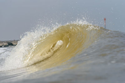 Close-up of water splashing in sea