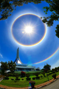 Low angle view of rainbow against sky