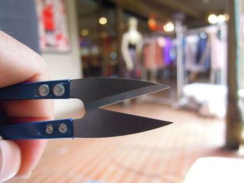 Trim fabric scissors hold