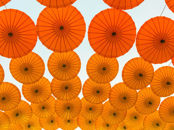 Colorful umbrellas floating on the steeet