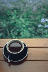 Close-up of coffee cup on table