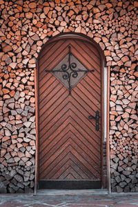 Closed wooden door of building