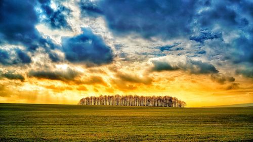 Scenic view of landscape against sky during sunset