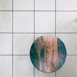 Directly above shot of table on tiled floor