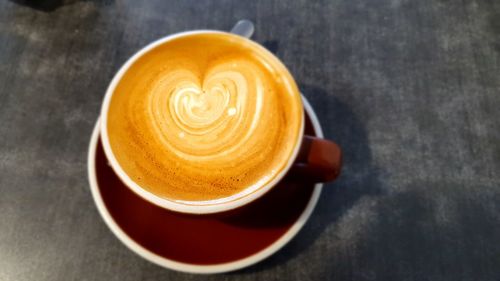 Close-up of cappuccino on table