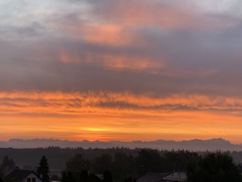 Scenic view of dramatic sky during sunset