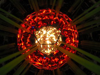 Low angle view of illuminated lights hanging from ceiling