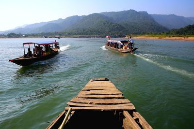 View of boating in calm lake