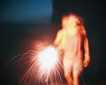 Low angle view of woman against sky