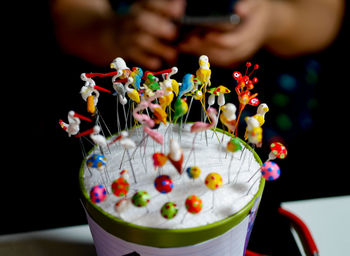 Close-up of multi colored candies on table