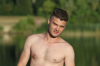 Portrait of shirtless young man