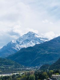 Scenic view of snowcapped mountains against sky