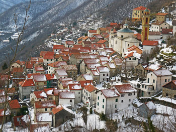 High angle view of village rooftop during winter season