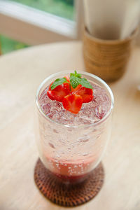 High angle view of drink in glass on table