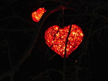 Close-up of red lights at night