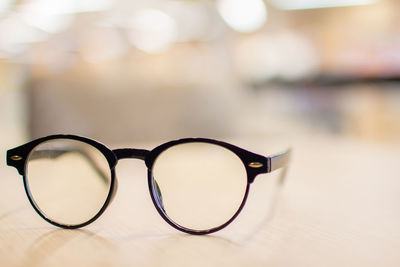 Close-up of sunglasses on table