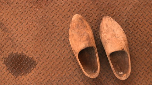 High angle view of shoes on flooring