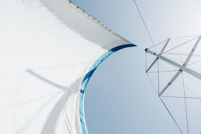 Low angle view of a boat sail against sky