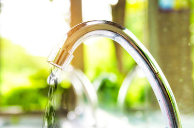 Close-up of water flowing from faucet