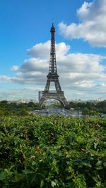 View of tower against cloudy sky