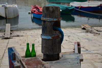 Close-up of wooden post at pier