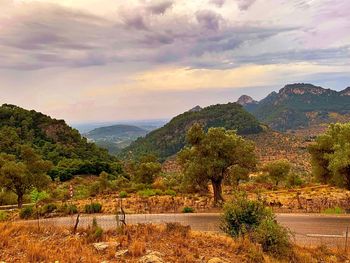 Scenic view of mountains against sky during sunset