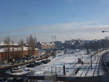 Panoramic view of train against sky during winter