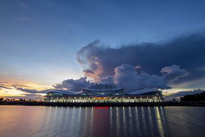 View of illuminated city at sunset