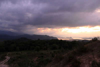 Scenic view of landscape against sky during sunset