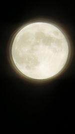 Low angle view of moon against sky at night