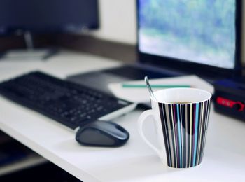 Coffee cup on table