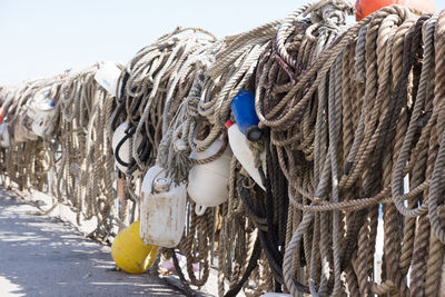 Close-up of tied hanging on rope