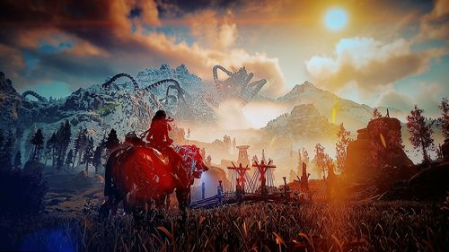 Close-up of multi colored water against sky during sunset