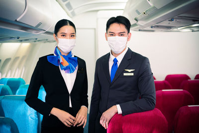 Portrait of man sitting in airplane