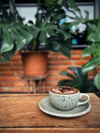 Close-up of coffee served on table