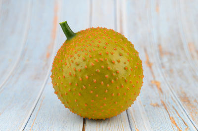 Close-up of orange fruit on table