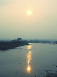 Scenic view of sea at sunset