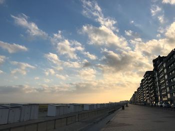 View of buildings against cloudy sky