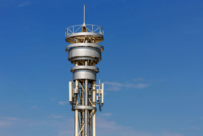 Cell tower against the blue sky