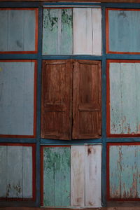 Window on wooden wall