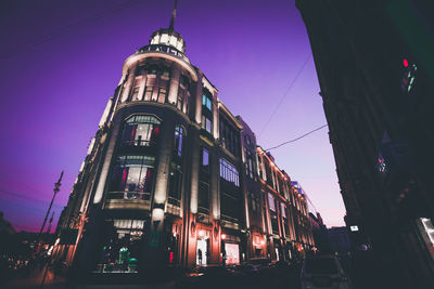 Low angle view of illuminated city at night