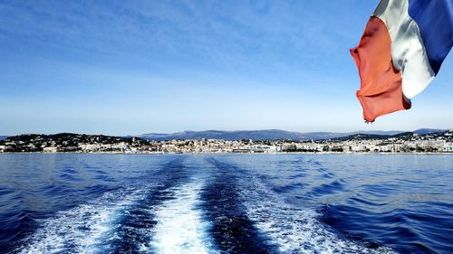 Scenic view of sea against clear blue sky